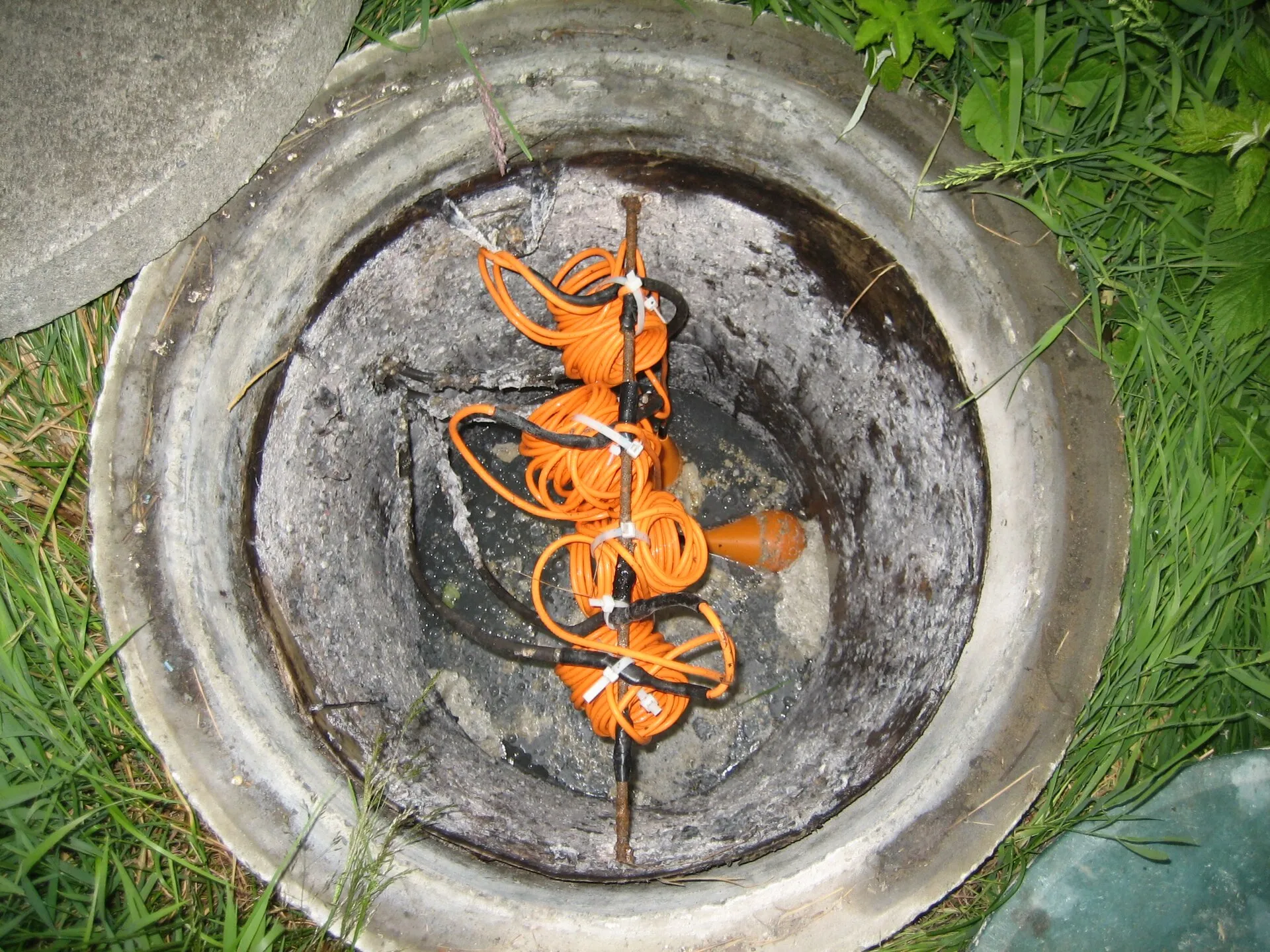 Aerobic septic system being serviced at a Hill Country home in Comal County, Texas